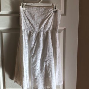 Beautiful white strapless eye-lit dress